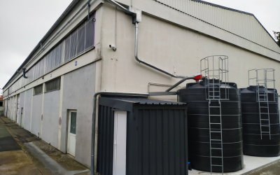Alimentation en eau de pluie d'une piste de lavage pour véhicules sur bâtiment existant
