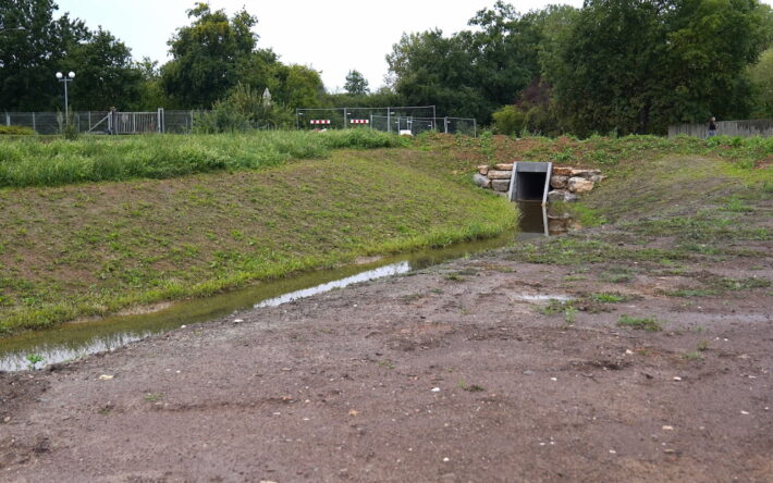 Le nouvel ouvrage hydraulique sous la rue Vinot va permettre de faire passer les eaux pluviales, depuis l’avenue Jean Jaurès à la plaine de la Lizaine. - Crédit photo : Banque des Territoires